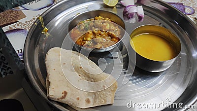 Indian served thali with dal, roti and sabji Stock Photo