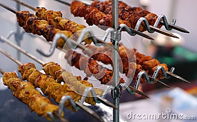 Indian street food vendor making mutton or non vegetarian kababs Stock Photo