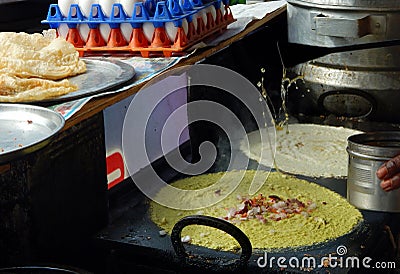 Indian street food vendor ready with ingredients to cook fast food on cart Stock Photo