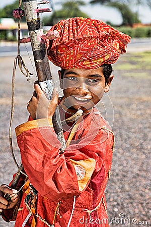Indian street musician playing the Sarangi in Rajasthan India Editorial Stock Photo