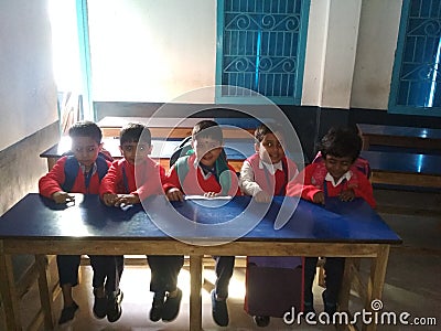 Indian students, sitting on a bench, Editorial Stock Photo