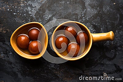 Indian sweet Gulab Jamun served in a ceramic bowl, selective focus Stock Photo