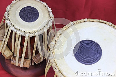 Indian tabla drums on a red background Stock Photo