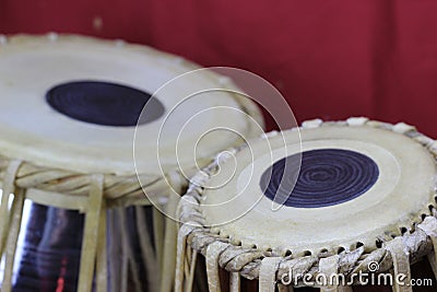 Indian tabla drums on a red background Stock Photo