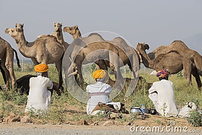 Indian three men attended the annual Pushkar Camel Mela. India Editorial Stock Photo