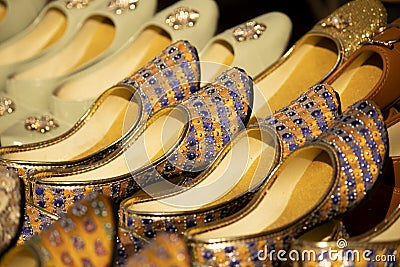 Indian traditional Colorful Punjabi Jutti shoes stall background Stock Photo