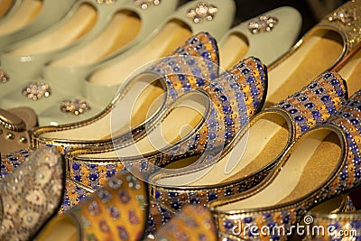 Indian traditional Punjabi Jutti shoes stall background Stock Photo