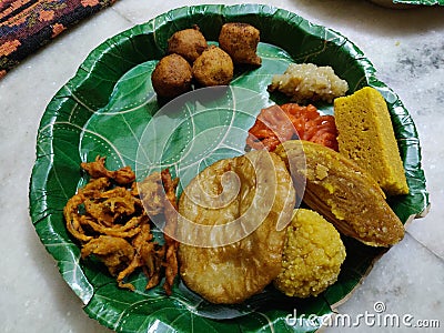 Indian traditional sweets in the plate to serve Stock Photo