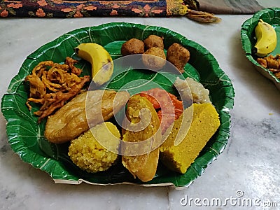 Indian traditional sweets in the plate to serve Stock Photo