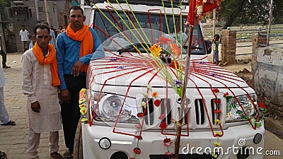Indian two friends with a car decoret with flawor Editorial Stock Photo