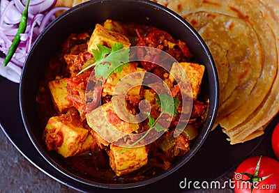 Indian vegetarian meal-Kadai Paneer and lachcha paratha Stock Photo