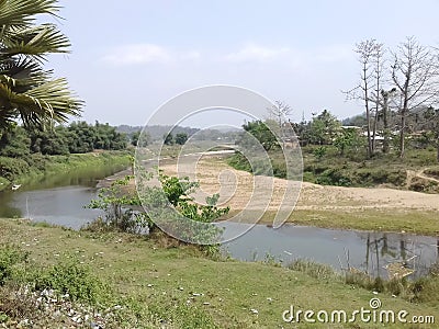 Indian Village Beautiful River and Hill Scenery in Tripura . Stock Photo