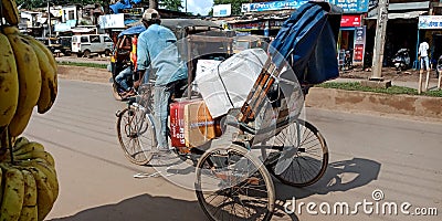 An indian village rickshaw rider on street transportation Editorial Stock Photo