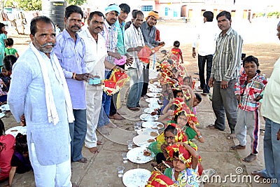 Indian villagers blessing young girls Editorial Stock Photo