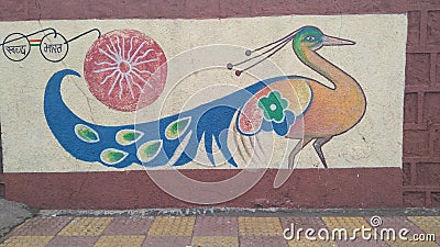 INDIAN WALL PAINTING OF A PEACOCK ON ROAD SIDE BHOPAL Editorial Stock Photo