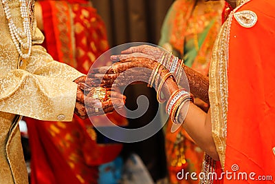 Indian wedding photography ,groom and bride hands Stock Photo