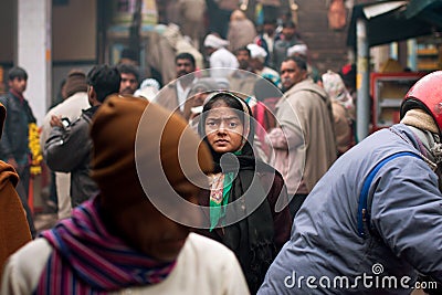 Indian woman looking for someone in the crowd Editorial Stock Photo