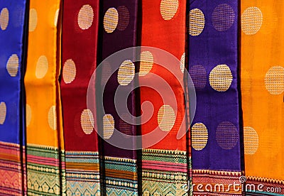 Indian woman sarees hung in shop display Stock Photo