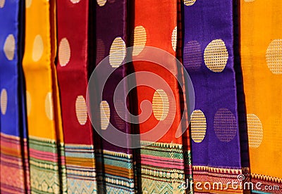 Indian woman sarees hung in shop display Stock Photo