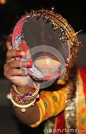 Diya deepak in hand karwa choth Stock Photo