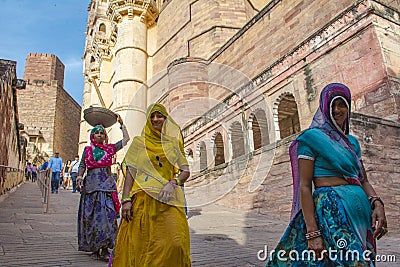 Indian women go out from castle Editorial Stock Photo