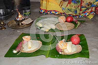 Indian women offering her prayers with fruits and bundle of bananas during the festival of Chhath Puja. Editorial Stock Photo