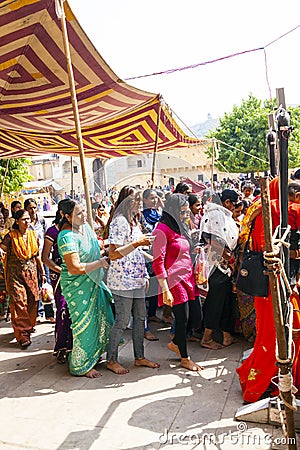 Indian women queue up for entrance to the annual Navrata Festival Editorial Stock Photo
