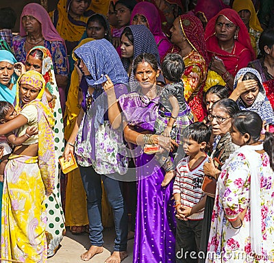 Indian women queue up for entrance to the annual Navrata Festival Editorial Stock Photo