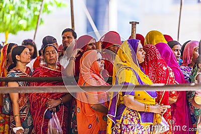 Indian women queue up for entrance to the annual Navrata Festival Editorial Stock Photo