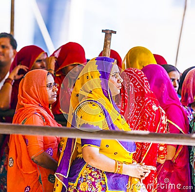 Indian women queue up for entrance to the annual Navrata Festival Editorial Stock Photo