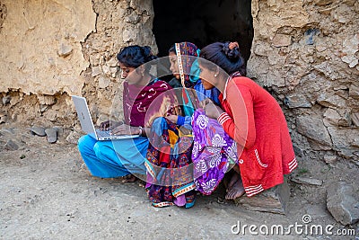 Indian women using laptop Editorial Stock Photo