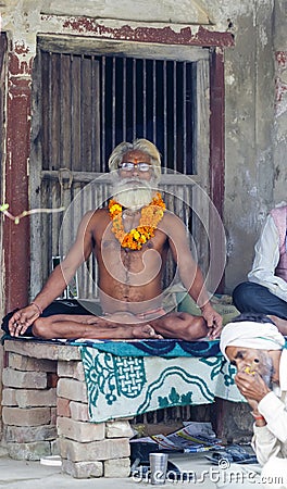 Indian yogi Baba Ramis commits rites sacred rituals.India, Anor , November 2016 Editorial Stock Photo