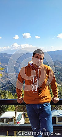 Indian young man looking this beautiful natural place. Editorial Stock Photo