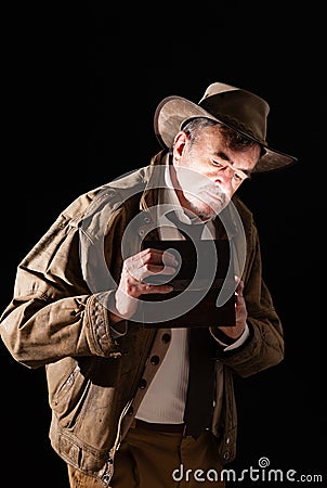 Explorer with wooden box Stock Photo