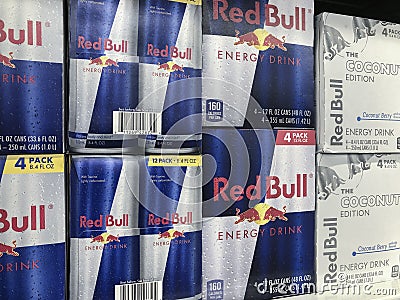 Red Bull Energy Drink display. Red Bull makes over 20 types of energy drinks with caffeine, taurine, and B vitamins Editorial Stock Photo