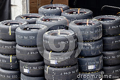 Indianapolis - Circa September 2018: Sets of Goodyear Eagle NASCAR Racing tires III Editorial Stock Photo