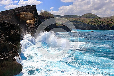 Indic sea waves hitting the cliff rocks at Angelâ€™s Billabong point, an amazing spot close to Broken beach in Nusa Penida Island Stock Photo