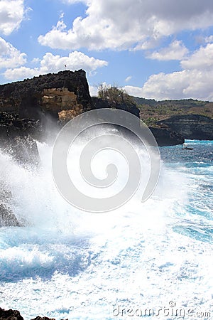 Indic sea waves hitting the cliff rocks at Angelâ€™s Billabong point, an amazing spot close to Broken beach in Nusa Penida Island Stock Photo