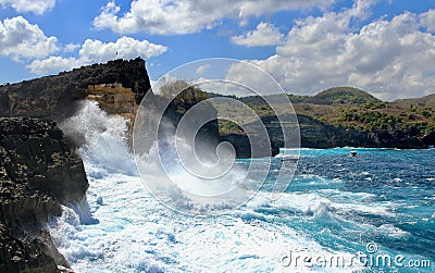 Indic sea waves hitting the cliff rocks at Angelâ€™s Billabong point, an amazing spot close to Broken beach in Nusa Penida Island Stock Photo