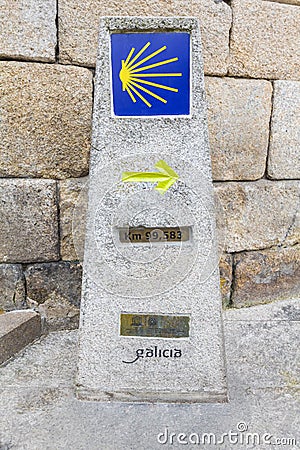 Indicator of the Camino de Santiago. Road sign in stone. Stock Photo