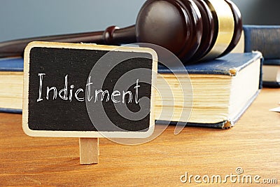 Indictment is shown on the photo using the text Stock Photo
