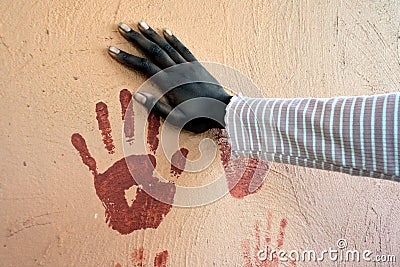 Indigenous Australian woman hand print on a wall Stock Photo