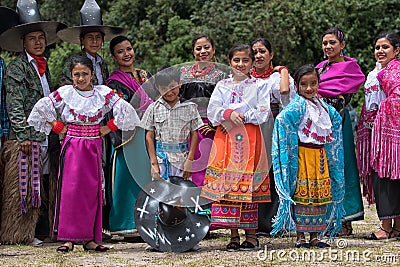 Indigenous dancers posing at a rural rodeo in Ecuador Editorial Stock Photo