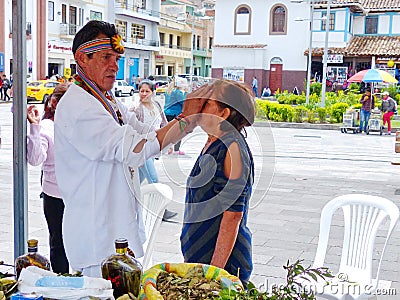 Indigenous healer performing health ceremony, Ecuador Editorial Stock Photo