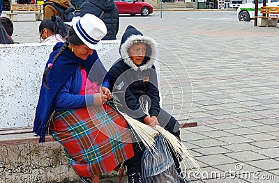 Indigenous woman from Ecuador and making panama hat Editorial Stock Photo