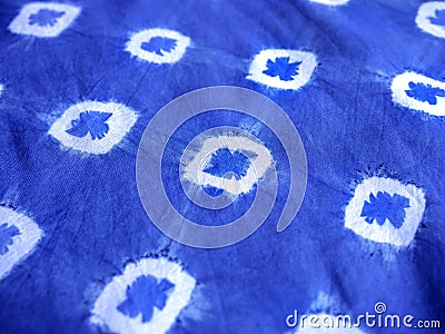 Indigo blue fabric tie dye pattern background. Stock Photo