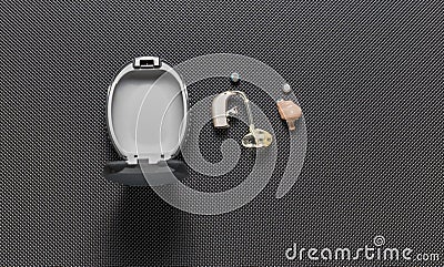 Individual digital hearing aid device for deaf and hard of hearing patients. Stock Photo