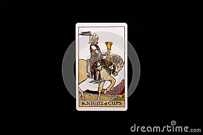 An individual minor arcana tarot card isolated on black background. Knight of cups. Stock Photo