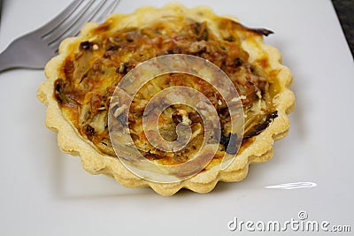 Individual quiche with onions Stock Photo