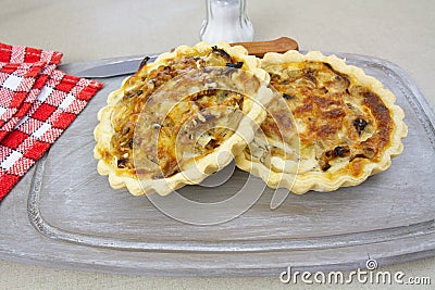 Individual quiche with onions Stock Photo